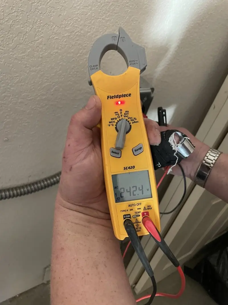 Voltage testing with clamp meter during Generator Installation in Hillsborough